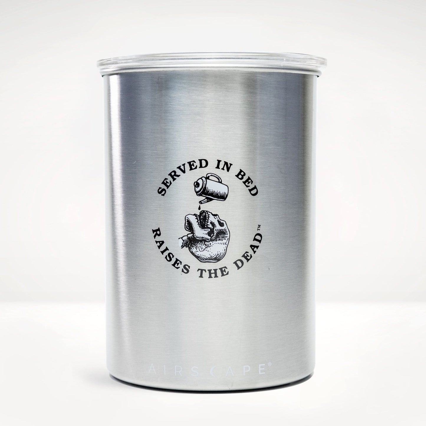 Served in Bead Raises the Dead™ Deadman's Reach® coffee tagline surrounding a black and white skull with coffee dripping into it's mouth on the back of a Airscape® Canister