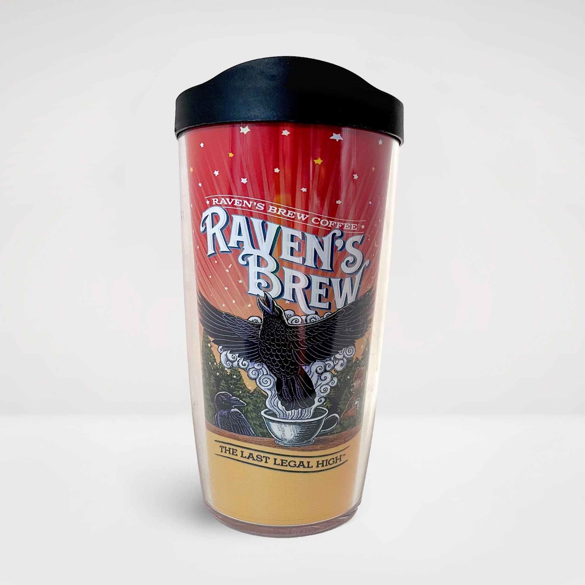 Raven's Brew Coffee® label artwork featured on a plastic travel tumbler with lid.