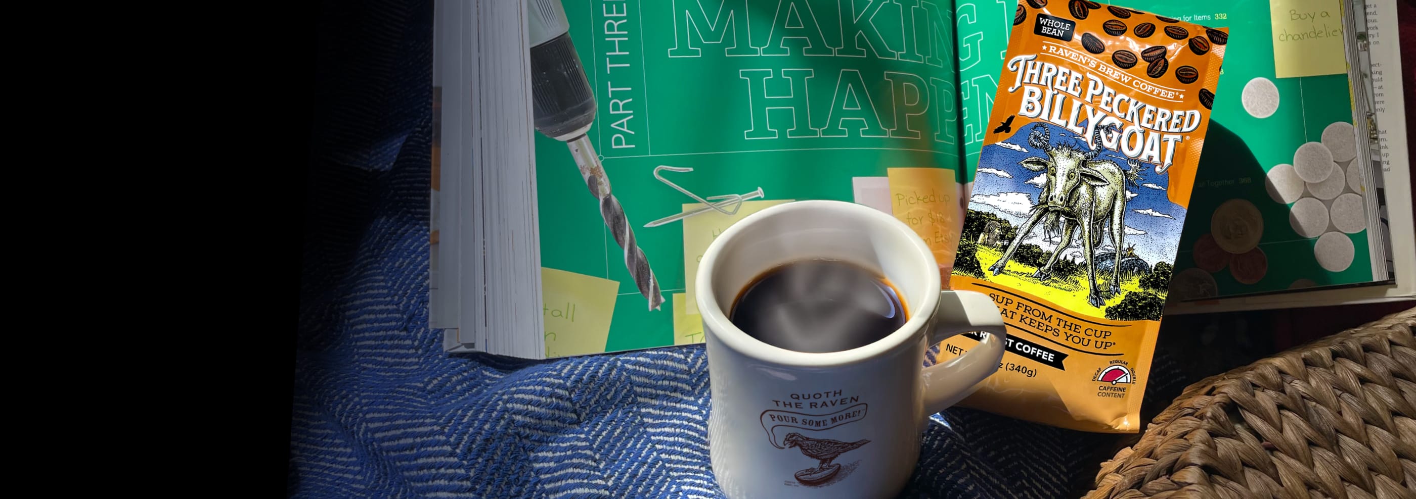 Three Peckered Billy Goat Coffee laid on top of an open book reading "making things happen". A warm mug of coffee sits in front of the book.