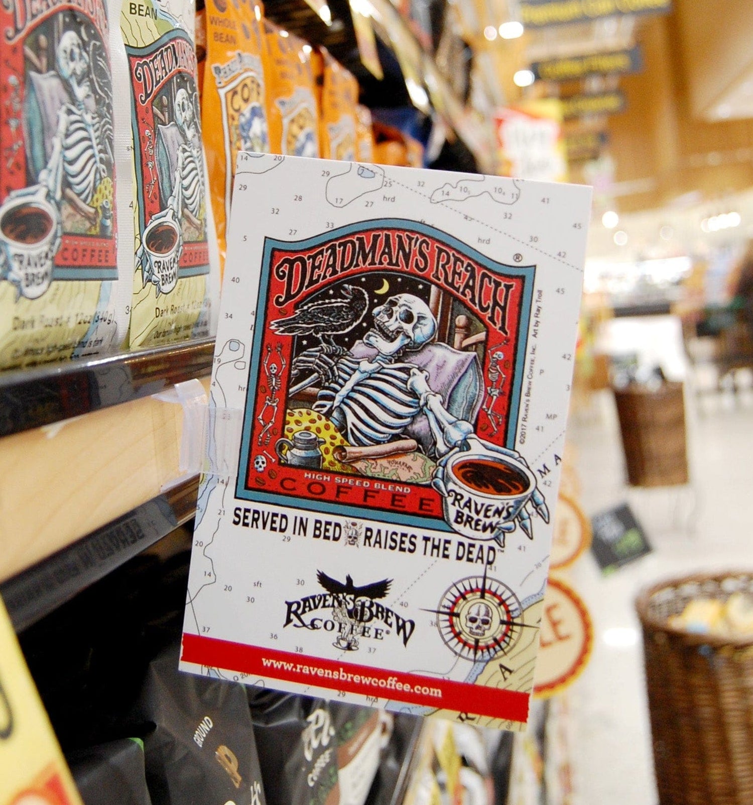 Supermarket aisle with coffee bags featuring Deadman's Reach Coffee
