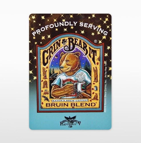 Bruin Blend® Coffee Label Art Cling featuring a Brown grizzly bear wearing a Raven's Brew® Coffee t-shirt drinking a mug of steaming coffee and the words Profoundly Serving, Grin & Bear It and Bruin Blend®.