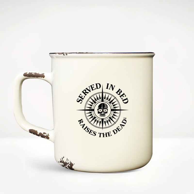 Deadman's Reach® Camp Mug back view featuring Served in Bead Raises the Dead™ Deadman's Reach® coffee tagline surrounding a compass rose with a skull at its center.
