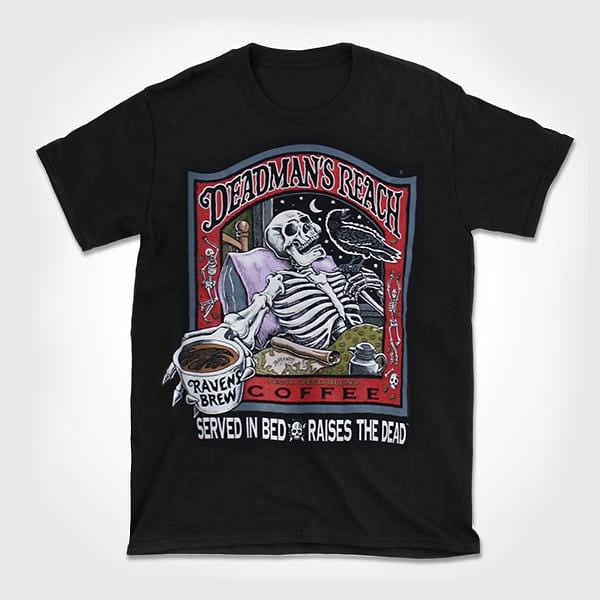 Deadman’s Reach® Coffee Label T-shirt in black featuring a skeleton reclined in bed, extending a steaming cup of Raven’s Brew coffee outwards towards the viewer. A black raven sits perched on a finger on his other hand Deadmans Reach® Coffee.
